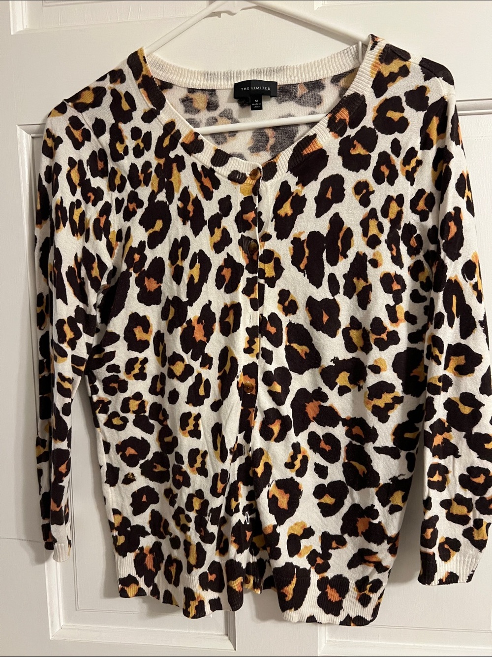 The Limited White Leopard Print Cardigan with Brown and Gold Accents